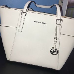 white Michael Kors purse